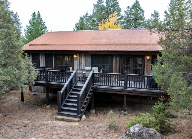 view of front of home featuring a wooden deck