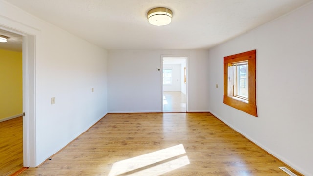 empty room featuring light hardwood / wood-style flooring