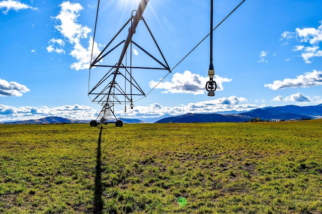 property view of mountains featuring a rural view