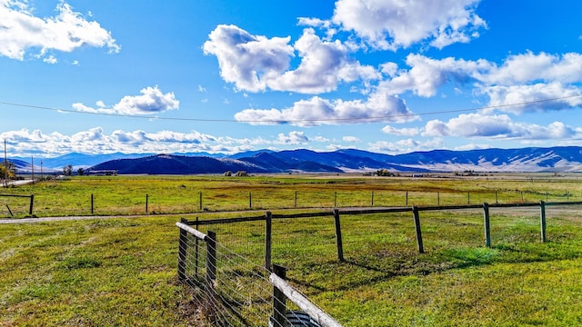 view of mountain feature with a rural view