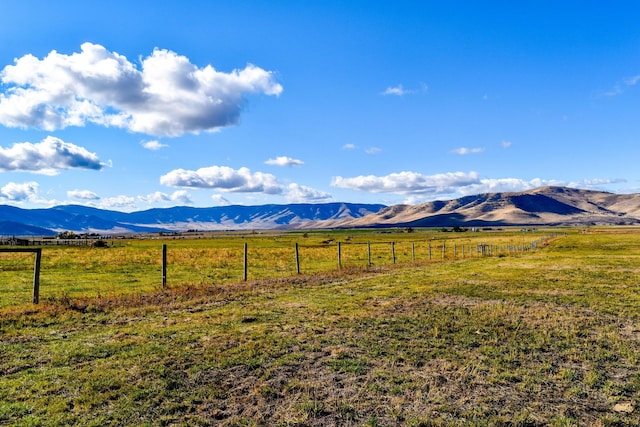 view of mountain feature with a rural view