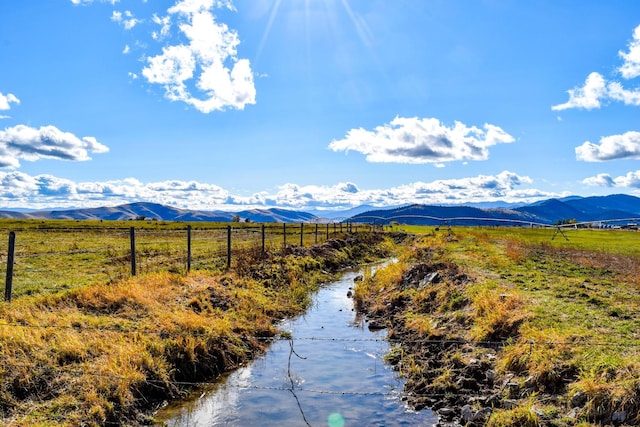 view of mountain feature featuring a rural view