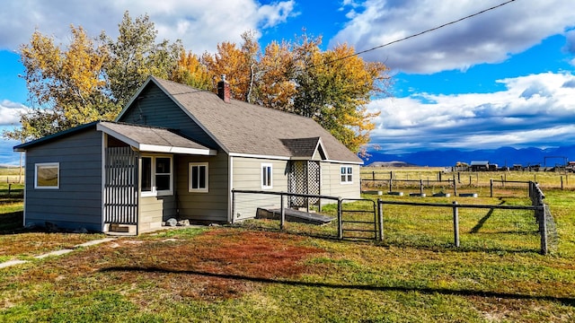 view of home's exterior with a yard