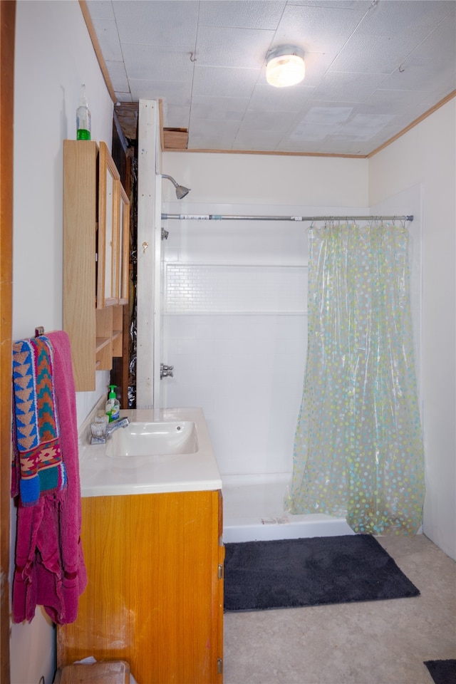 bathroom with vanity and shower / bath combo with shower curtain