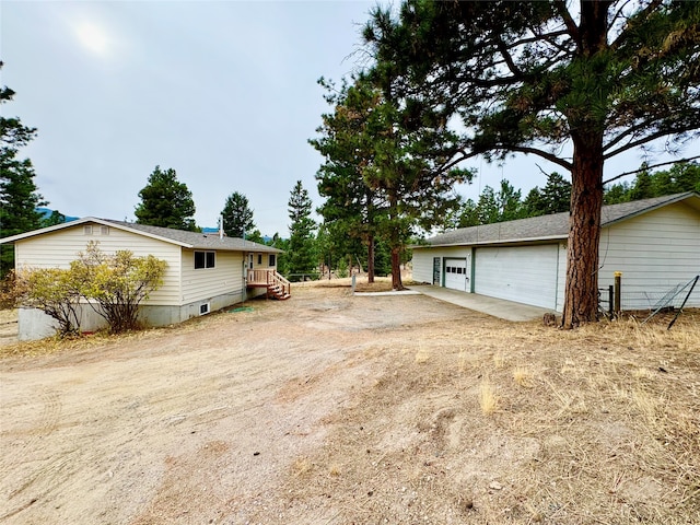 exterior space with a garage