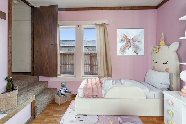 bedroom featuring light wood-type flooring