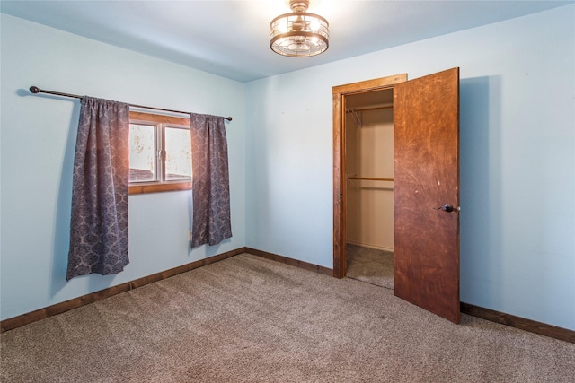 unfurnished bedroom featuring carpet flooring