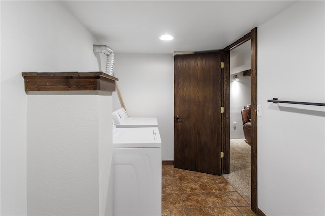 laundry room featuring washing machine and clothes dryer