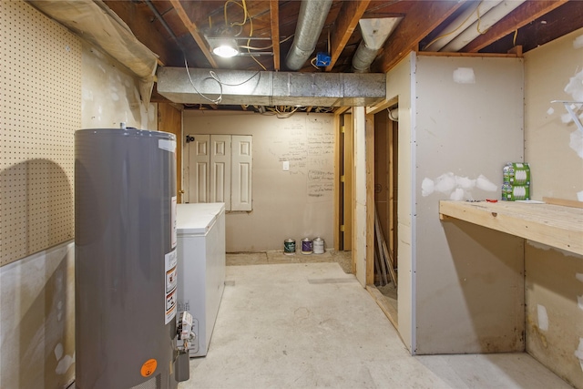 basement with washer / clothes dryer and gas water heater