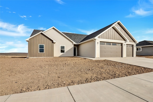 craftsman house with a garage