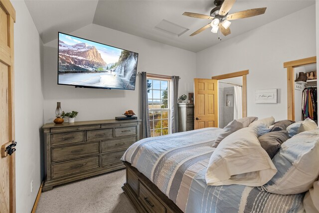 bedroom with light carpet, lofted ceiling, and ceiling fan