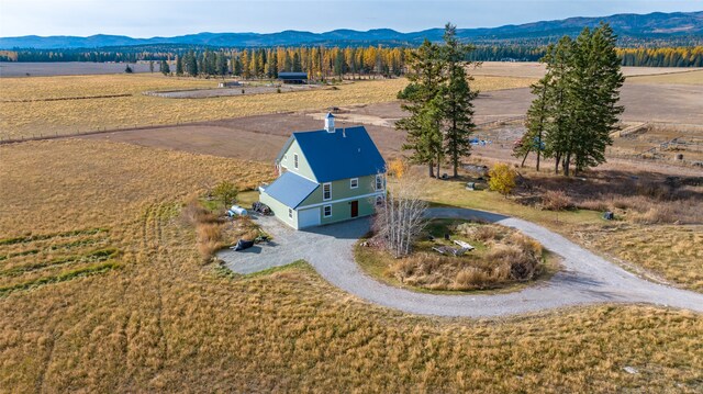 bird's eye view with a rural view and a mountain view