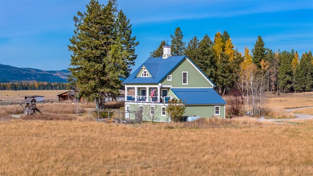 view of front of house featuring a mountain view