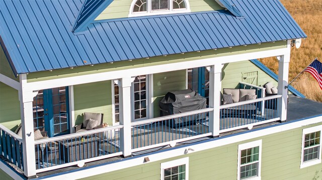 view of property exterior featuring a balcony