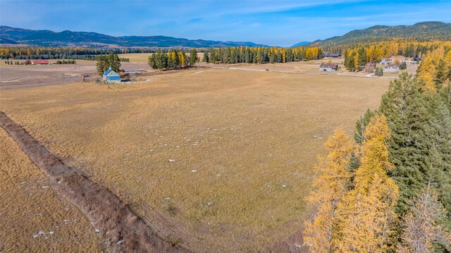 mountain view featuring a rural view