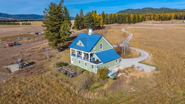 bird's eye view with a mountain view