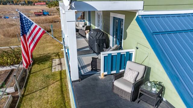 view of patio featuring a grill