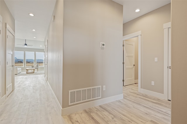 hall featuring light wood-type flooring