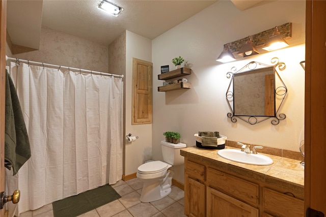 bathroom with vanity, toilet, tile patterned floors, and a shower with curtain