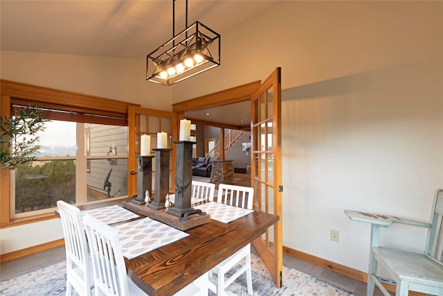 dining room with vaulted ceiling