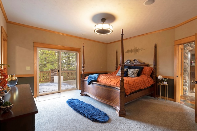 carpeted bedroom featuring crown molding, a textured ceiling, and access to exterior