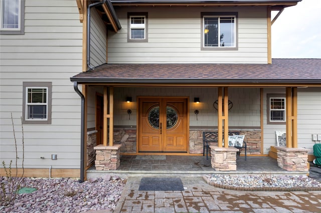 property entrance featuring covered porch