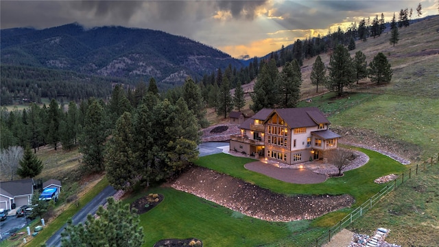 aerial view at dusk with a mountain view