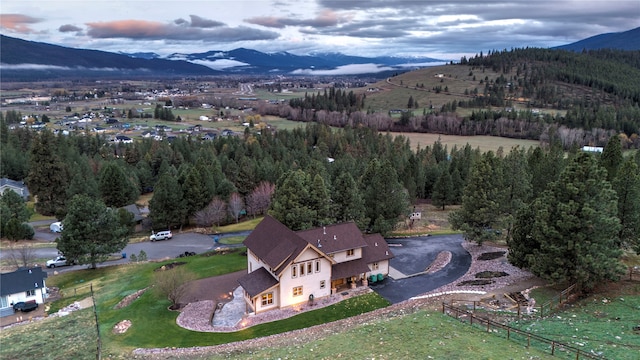 aerial view at dusk with a mountain view