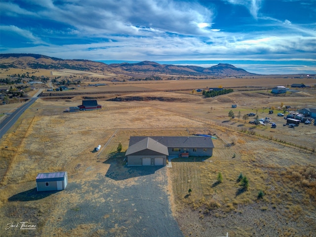 drone / aerial view with a rural view and a mountain view