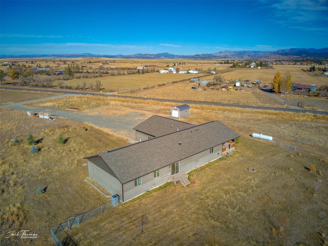 aerial view featuring a rural view and a mountain view