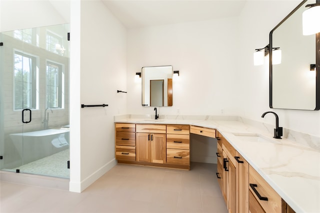 bathroom with vanity, a shower with shower door, and tile patterned floors