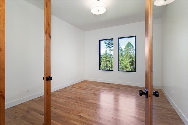 empty room with light wood-type flooring