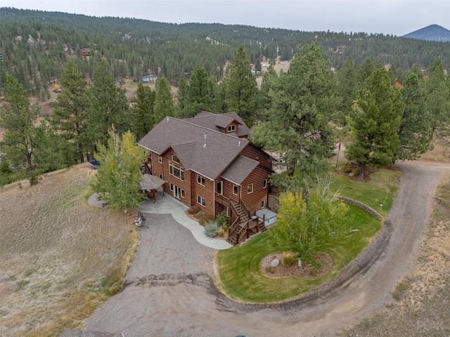 214 Solomon Mountain Rd, Clancy, MT 59634 - aerial view of property and surrounding area with a heavily wooded area