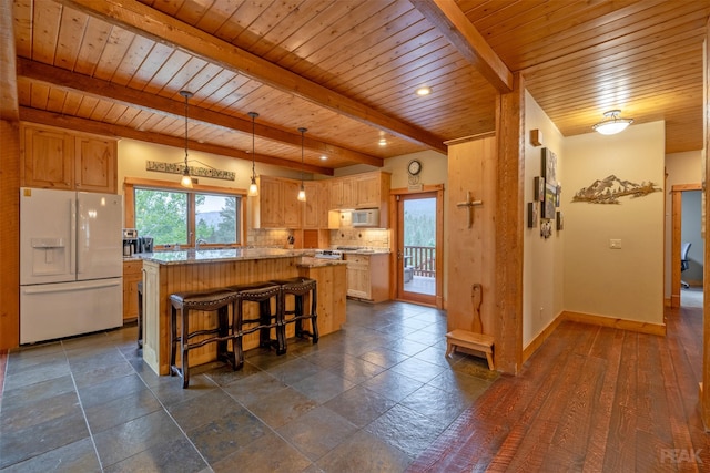214 Solomon Mountain Rd, Clancy, MT 59634 - kitchen featuring white appliances, a wood ceiling with exposed beams, a center island, decorative backsplash, and light stone countertops