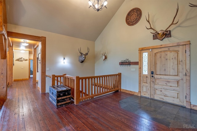 214 Solomon Mountain Rd, Clancy, MT 59634 - foyer featuring hardwood / wood-style flooring, a chandelier, and high vaulted ceiling