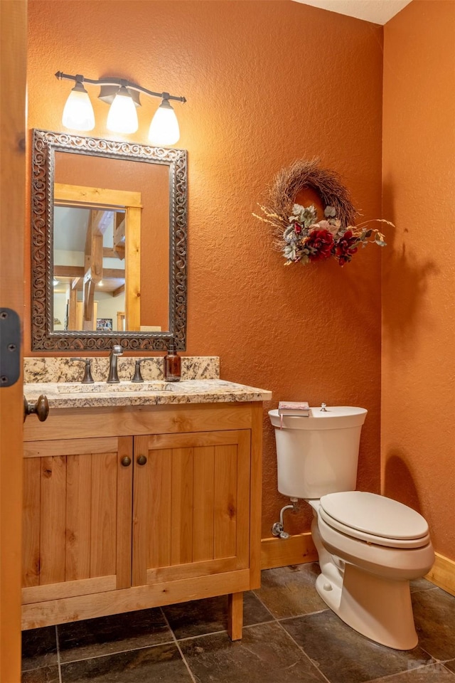 214 Solomon Mountain Rd, Clancy, MT 59634 - bathroom with vanity and a textured wall