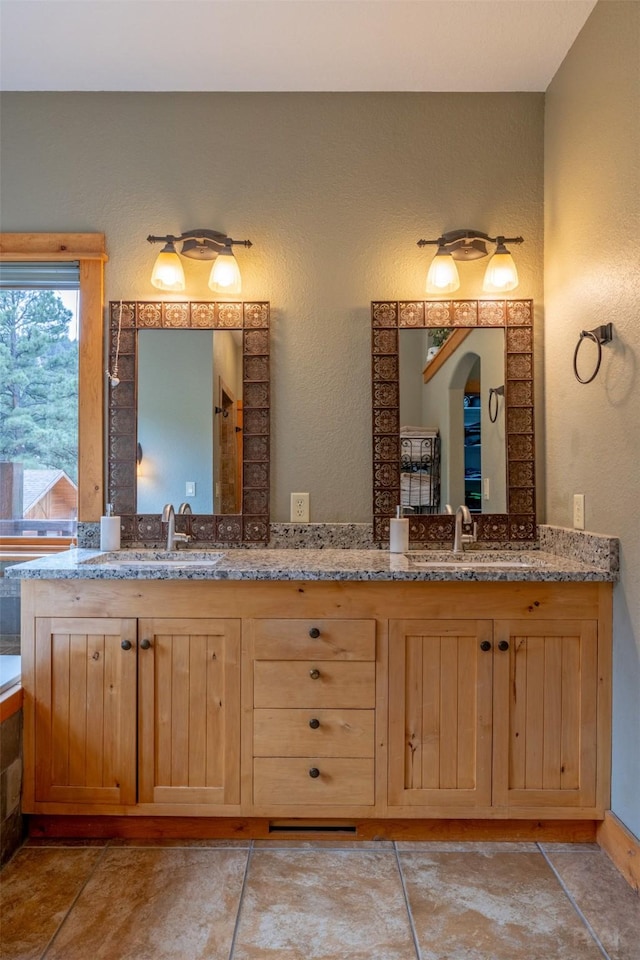 214 Solomon Mountain Rd, Clancy, MT 59634 - bathroom featuring double vanity and a tub