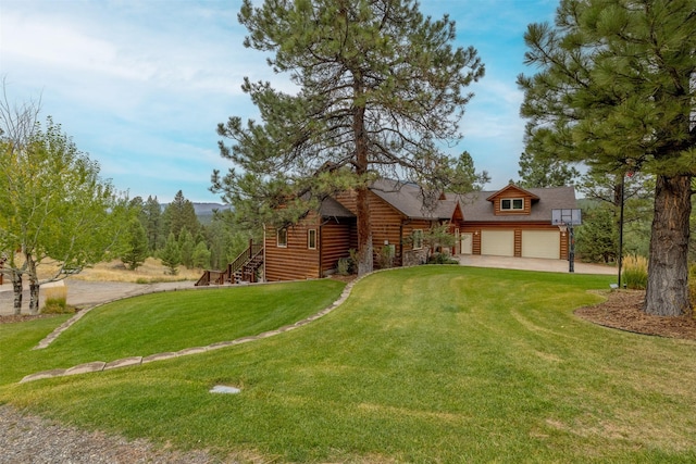 214 Solomon Mountain Rd, Clancy, MT 59634 - view of front facade with a front lawn, driveway, faux log siding, and an attached garage