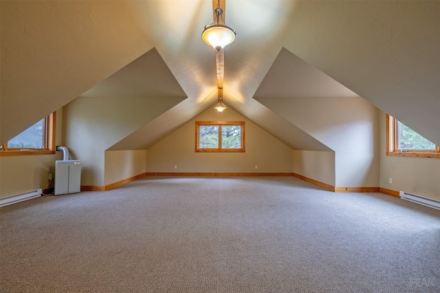 214 Solomon Mountain Rd, Clancy, MT 59634 - bonus room with carpet flooring, vaulted ceiling, and baseboard heating