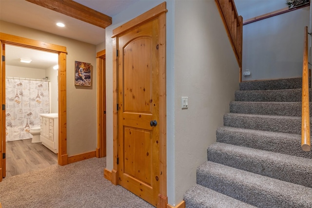 214 Solomon Mountain Rd, Clancy, MT 59634 - stairway featuring carpet, recessed lighting, and wood finished floors