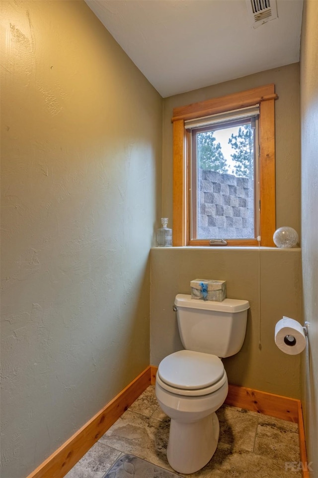 214 Solomon Mountain Rd, Clancy, MT 59634 - half bath with baseboards and toilet