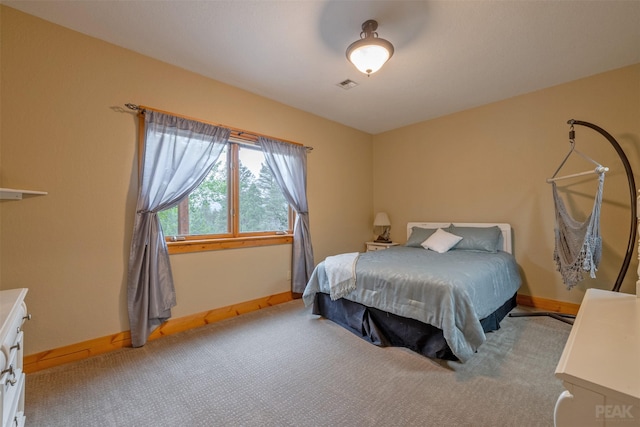 214 Solomon Mountain Rd, Clancy, MT 59634 - carpeted bedroom featuring baseboards