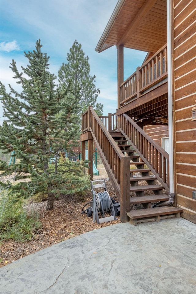 214 Solomon Mountain Rd, Clancy, MT 59634 - view of patio featuring stairway and a deck