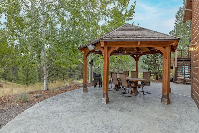 214 Solomon Mountain Rd, Clancy, MT 59634 - view of patio with outdoor dining area, a gazebo, and stairs