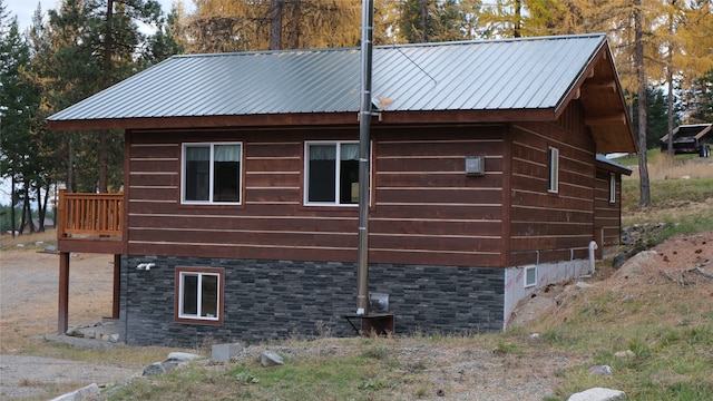 view of property exterior featuring a balcony