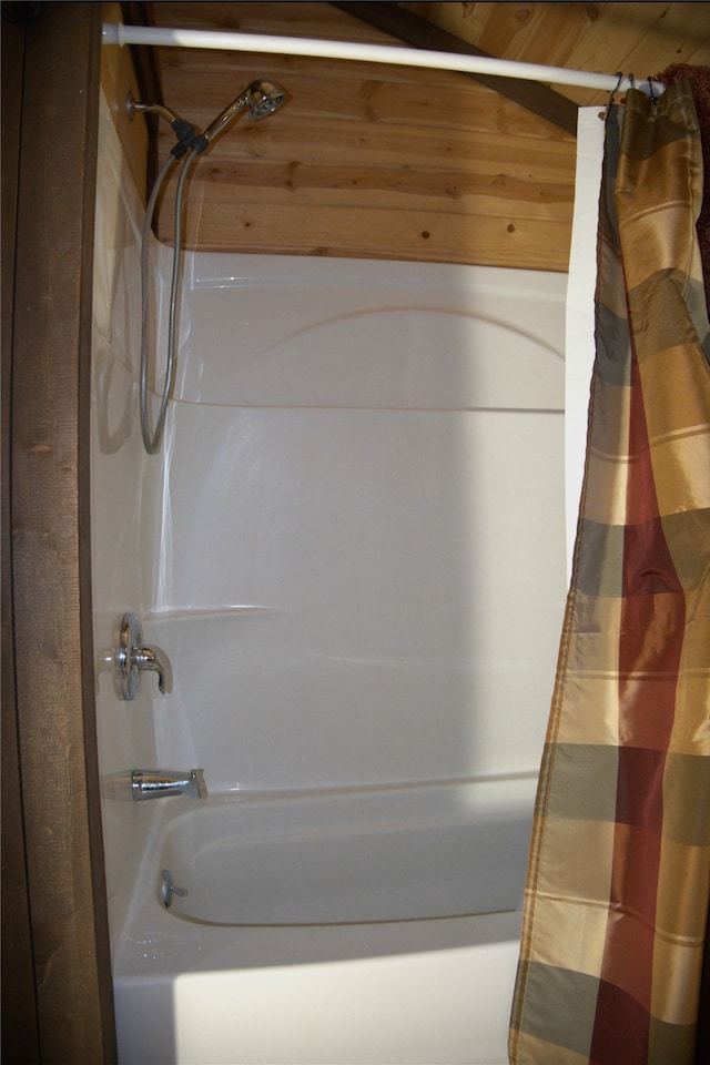 bathroom featuring shower / bath combination with curtain