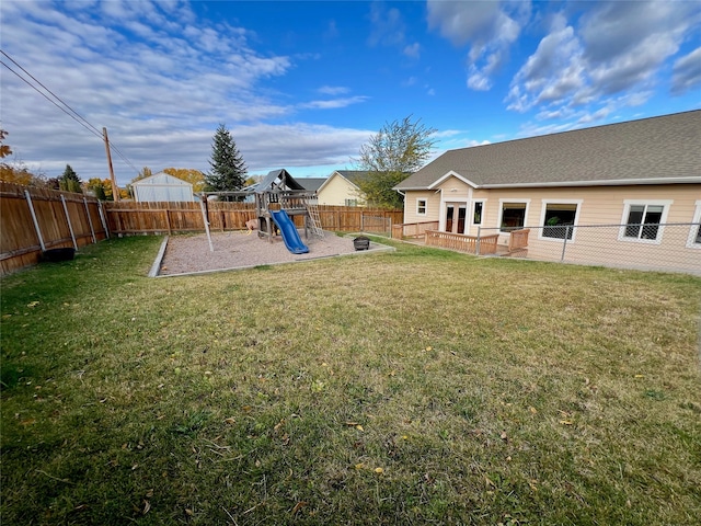 view of yard featuring a playground