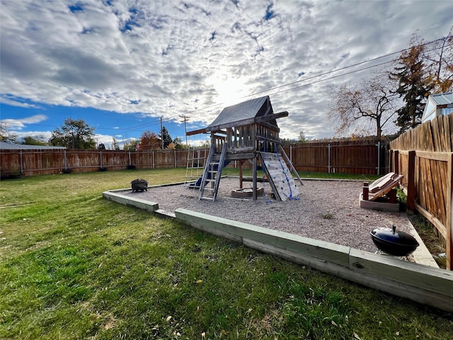 view of jungle gym with a lawn