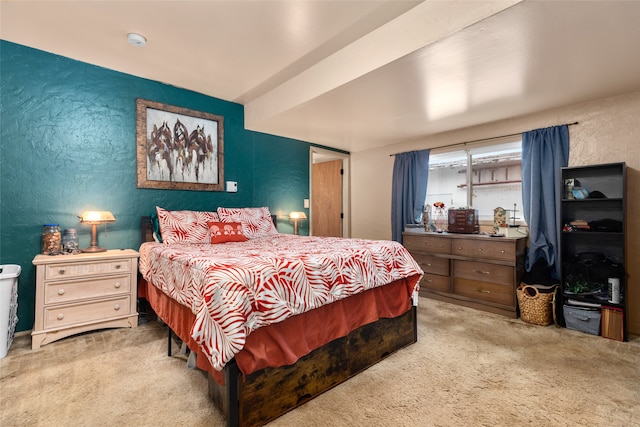 bedroom with light colored carpet