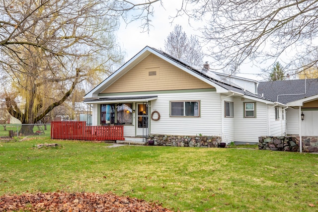 view of front of home with a front lawn